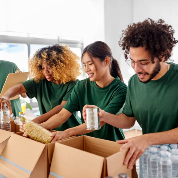 Volunteers packing donation boxes